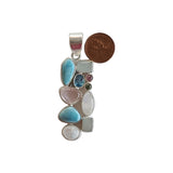 Larimar, Rainbow Moonstone, Blue Topaz, Pink Tourmaline, Green Tourmaline, Rose Quartz and Aquamarine handmade gemstone pendants.