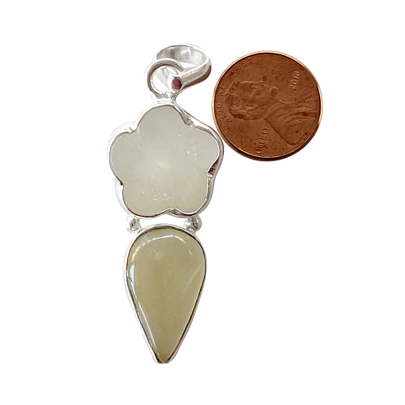 Golden rutilated quartz and shell carved handmade gemstone pendants.