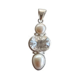 Clear quartz and freshwater pearl handmade gemstone pendants.
