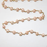 pink freshwater pearl birthstone month June, zodiac sign Pisces.
