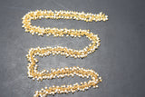 pearl smooth faceted bead cluster rosary chain.