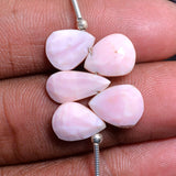 Pink Opal pear birthstone month october zodiac sign gemini and aquarius.