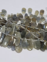 Gray sapphire faceted bead size 5X10-6X16mm, 5.5X6.5-5.5X20mm, 6X16-8X18.5mm, 6X20-6X23mm, 8.5X19.5-9X21mm, 7X22-7X27.5mm, 7.5X20.5-8X22mm, 8.5X20-9.5X23.5mm, 9.5X24-8X29mm, 10X24.5-11.5X30mm.