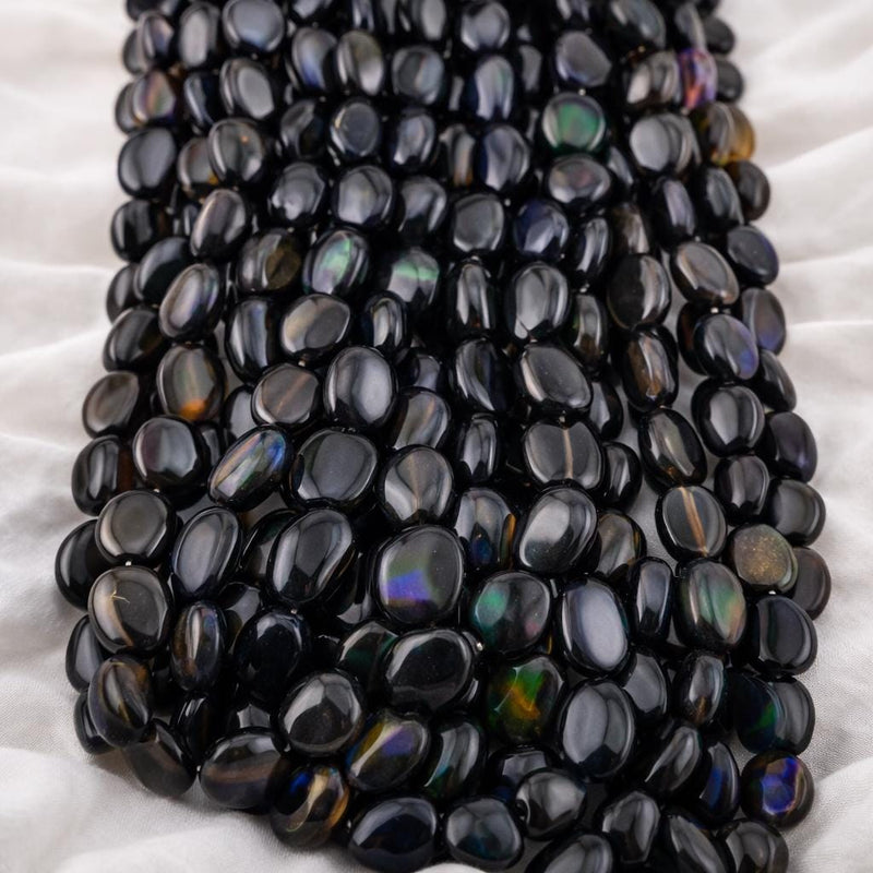 Ethiopian black opal oval beads strand — natural Welo smooth cabochon gemstone with blue green rainbow fire, AAA quality bulk lot for jewelry making