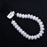 Snowlite smooth bead size 12.5-13mm.