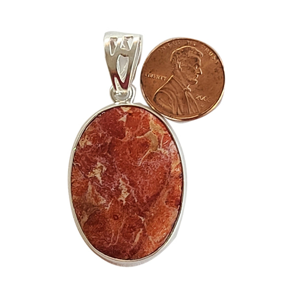 Coral handmade gemstone pendants.
