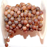 light brown druzy birthstone month February - March, zodiac sign Libra.