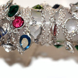 multi color bezel birthstone month April, zodiac sign Leo.