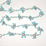 blue topaz faceted bead cluster rosary chain.