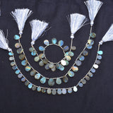 Labradorite faceted bead size 6.5X9.5-8.5X11mm.
