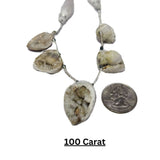 Handmade cowrie shell bracelet with charm