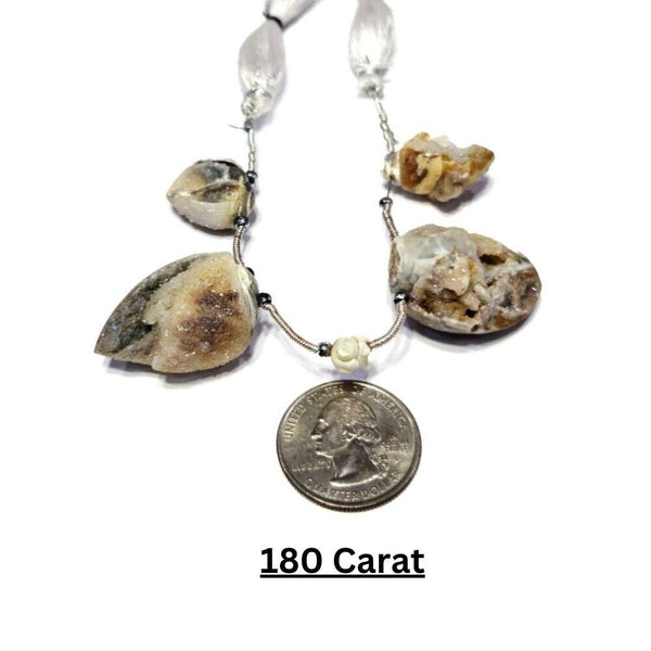 Handmade cowrie shell bracelet with charm
