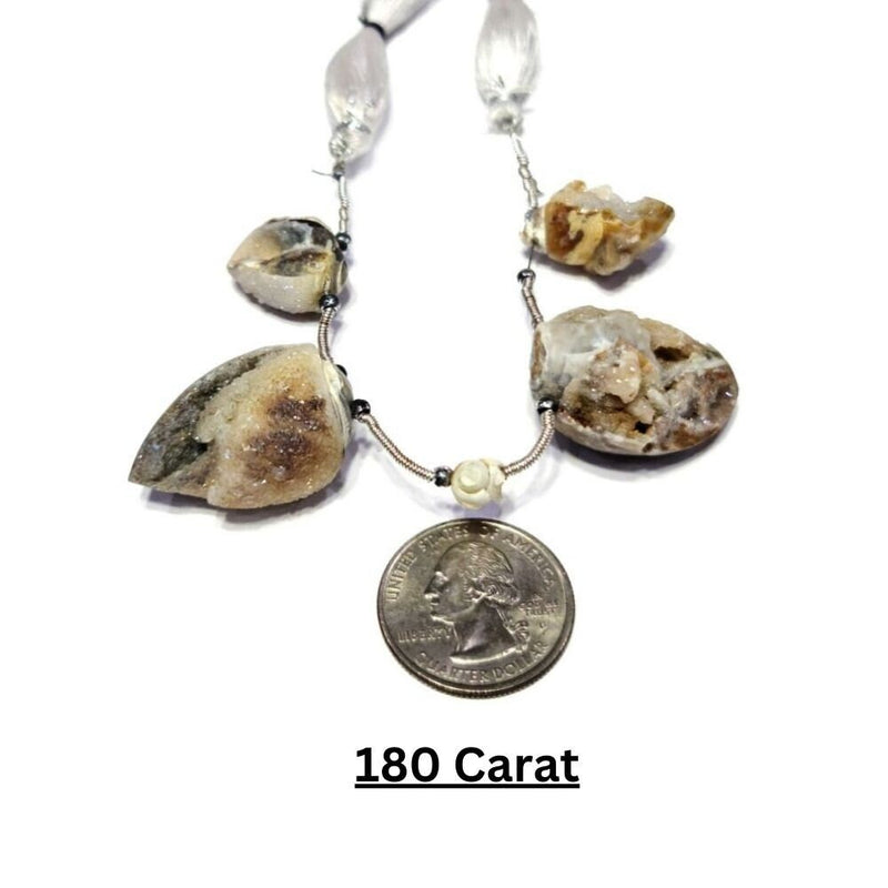 Handmade cowrie shell bracelet with charm