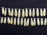 Green grapolite gemstone bead strands, pear-shaped 4-inch long bead strand, faceted bead size 10.5X28-9X34mm, handmade gemstone bead strand 81 carats, women jewelry making necklaces, earrings, and bracelets bead strands.