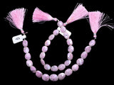 Pink Grapolite flat tumble shaped birthstone month september zodiac sign capricorn and aquarius.