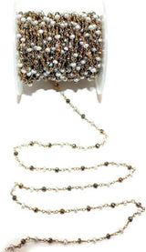 pyrite & freshwater pearl birthstone month July - August & June, zodiac sign Leo.