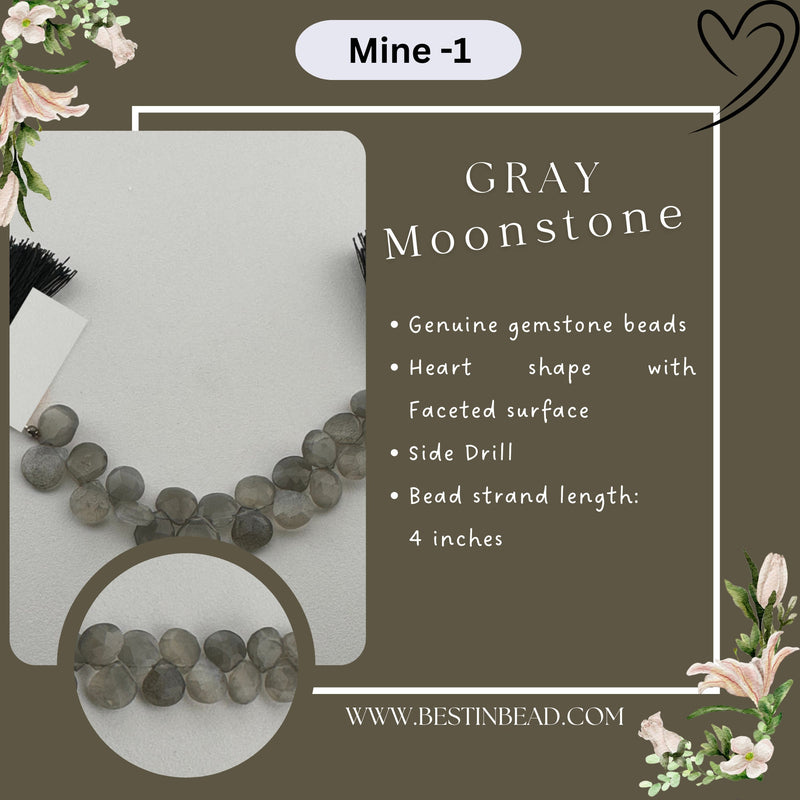 Close-up of a 4-inch strand of 7.5-8mm gray moonstone faceted heart beads, showing their soft shimmer on a white background.