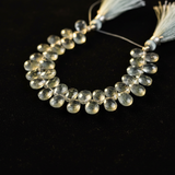 AAA Grade Moss Aquamarine faceted pear briolette beads on black velvet – side drilled natural gemstone strand for wire wrapping